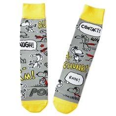 Fly high with Snoopy the World War I Flying Ace who appears on these gray crew socks in a variety of poses, his successes and letdowns depicted in drawings and word bubbles. This fun pair of socks sends a message of determination and courage in the cheerful way that Snoopy has touched hearts for generations. | Snoopy Flying Ace novelty crew socks feature illustrations of the Peanuts pilot pup in scarf and goggles with yellow toe and heel designs. | On socks: Contact! Pow! Aaugh! Ka-bam! Rats! | Snoopy Flying Ace, Snoopy Flying, Word Bubbles, Coworker Birthday Gifts, Plastic Gift Bags, Yellow Socks, Peanuts Snoopy Woodstock, Flying Ace, Grey Socks