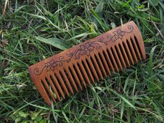 Handmade hair comb. 90 years old Acacia wood. Finish - linseed oil Measurements: 4.88in - 1.77in (12,4cm - 4,5cm) Metal and other hard objects can damage and scratch the products Keep away from your pet  How to take care of the wooden and horn combs: Our combs can be used on damp hair and beard but do not leave the comb exposed to water for long periods of time. Dry the damp comb with a cloth. Do not use a dryer or another electrical appliance. Do not heat, there is a risk of fissures in the woo Wood Hair Comb, Wood Hair Barrette, Filigree Tattoo, Wood Carving Designs, Carving Designs, Wood Carving Art, Linseed Oil