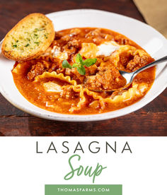 lasagna soup in a white bowl with bread on the side and text overlay that reads lasagna soup