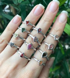 "A collection of dainty stackable tourmaline sterling silver ring in a variety of colors and shapes is sure to impress your boho friends. These are one-of-a-kind rings which we have chosen each stone and set it in a simple bezel setting with a low profile. Wrapped in a box ready for gift-giving.(r-nc-92) Choose your favorite Tourmaline Ring from the last photo We offer sizing services for a nominal fee contact us for pricing ---> Don't know your ring size? Purchase our ring sizing gauge https Silver Tourmaline Birthstone Ring With Gemstone, Stackable Tourmaline Jewelry As Gift, Stackable Tourmaline Jewelry For Anniversary, Stackable Tourmaline Jewelry Gift, Fine Jewelry Sterling Silver Stackable Rings With Gemstone Accents, Silver Tourmaline Birthstone Ring Gift, Sterling Silver Stackable Rings With Gemstone Accents, Silver Emerald Ring With Tourmaline Birthstone, Stackable Tourmaline Rings Fine Jewelry