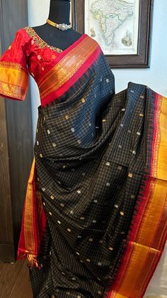 Pure Gadwal silk saree with prestitched blouse online shopping Comes with prestitched embroidered blouse. Blouse : 36 - 42 size DETAILS AND CARE Color: black Weight : 600 - 800 gramsLength : 5.5 m saree + 0.7 m blouse Width : 48 InchesFabric : Pure Gadwal silk Craft Description : gAdwal Wash Care : Dry Wash OnlyShipping Time : 5 - 7 Working daysWe Ship Worldwide SHIPPING AND RETURNS Shipping Policy :Shipping days as mentioned above, subject to changes based on the government regulations around the prevailing pandemic situation.Return Policy : We have a comprehensive returns policy , kindly refer to our policy section to know more . DISCLAIMER Color :There can be a slight variance in the colors of the products on our site from the actual ones. This is attributed to the reproduction of color Black Silk Saree, Red Velvet Blouse, Indian Wedding Sarees, Readymade Blouses Online, Wedding Sarees Online, Attractive Dresses, Wedding Silk Saree, Wedding Saree Indian, Black Saree