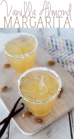 two glasses of vanilla almond margarita on a cutting board