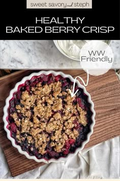 a pie sitting on top of a wooden cutting board next to a bowl of fruit