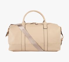 Crafted in classic travel shapes, this is your new go-to, go-anywhere travel set for getaways or weekend escapes. The duffel features vegan leather and tear-resistant lining. The toiletry bag is sized to keep under the sink or take with you for easy, on-the-go grooming. Eden Toiletry Bag Made with vegan leather with poly cotton lining. Zipper closure. Imported. Eden Duffle Bag Made with vegan leather with poly cotton lining. Interior features a zippered pocket and 2 open inner pockets. Features Customized Bridesmaid Gifts, Travel Duffel Bag, Travel Duffel, Duffel Bag Travel, A Gym, Monogrammed Leather, Travel Collection, Personalize Bag, Stylish Bag