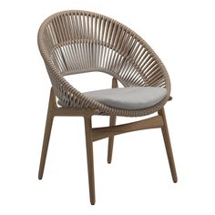 the rattan chair with grey cushion is shown in front of a white background,