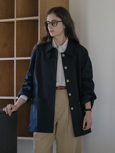 This is a trench coat with a luxurious feel made of sturdy material. It is bio-washed and features a soft touch and casual design. The collar neck has a tap decoration, allowing for a variety of styling, and the pockets have metal decorations to capture KNOWN BETTER's unique mood. This trench coat uses a cotton-touch lining to give it a natural feel.- Stitch finish that holds the shape of the collar- Incision line double stitch detail- Use buttons that match the color- Spacious pocket size- High mobility due to slit at the bottom of the back Cute Office Wear, Cool Tone Outfits Style, Half Trench Coat Outfit, Relaxed Fit Outerwear With Button Cuffs For Work, Classic Gabardine Outerwear For Daily Use, Classic Everyday Gabardine Outerwear, Classic Outerwear With Buttoned Pockets For Work, Utility Long Coat For Work, Classic Spring Workwear Peacoat