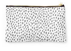 a white and black leopard print pouch bag