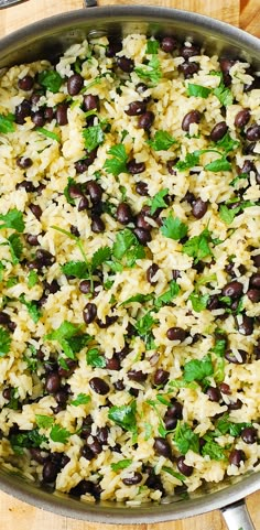 rice with black beans and cilantro in a pan