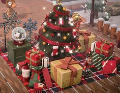 an animated christmas tree surrounded by presents and other holiday decorations on a plaid table cloth