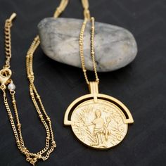 Vintage coin medallion necklace Details: - large gold plated medallion - gold plated satellite chain Dimension: Medallion: 30mm x 35 mm (1.25 inch x 1.5 inch) Chain length : 20 inch + 1 inch extension Gold Plated Medallion Chain Necklace With Coin Pendant, Brass Medallion Necklace With Gold Chain, Gold Plated Medallion Chain Necklace, Gold Medallion Necklace With Adjustable Chain, Gold Plated Medallion Locket Necklace, Tarnish Resistant Gold Plated Medallion Necklace, Gold Medallion Necklace With Large Pendant, Gold Plated Medallion Necklace, Gold Coin Medallion Necklace With Adjustable Chain