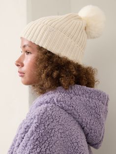 FOR: School, practice, and play FEEL: Warmth-trapping wool-blend yarn feels soft, stretchy, and sturdy FAVE: Faux-fur pom-pom adds whimsical fun to functional winter-wear One size. Bra Dress, Faux Fur Pom Pom, Pom Beanie, Fur Pom Pom, Winter Wear, Girls Accessories, Jacket Tops, Dress Accessories, Wool Blend