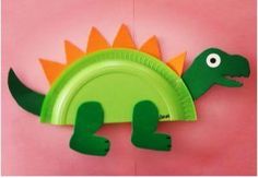 a paper plate shaped like a dinosaur