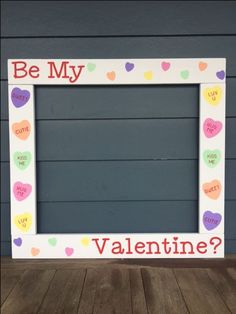 a valentine's frame with hearts on it that says, be my valentine?