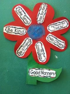 a flower made out of paper with words on it