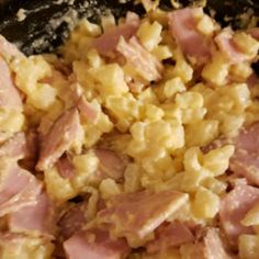 ham and macaroni cooking together in a skillet