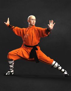 a man in an orange karate outfit is doing a kick with one hand and the other arm extended