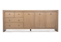 the sideboard is made from wood and has four drawers, two doors and one drawer