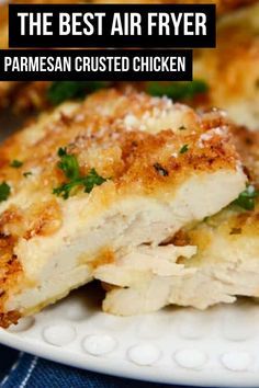 the best air fryer parmesan crusted chicken is on a white plate