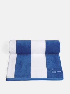 the blue and white towel is folded up