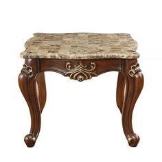 a small wooden table with marble top and carved details on the legs, against a white background