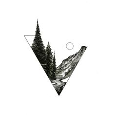 a triangle with trees and mountains in the background