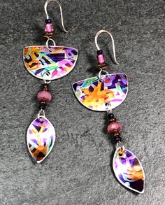 Totally unique item! Abstract floral pattern, and very light weight to wear. Purple Hand Painted Bohemian Earrings, Bohemian Hand Painted Purple Earrings, Artistic Multicolor Earrings With Colorful Design, Artistic Hand-painted Purple Earrings, Hand Painted Multicolor Summer Earrings, Hand Painted Multicolor Earrings For Summer, Multicolor Hand Painted Earrings For Summer, Unique Hand Painted Purple Earrings, Artistic Multicolor Summer Jewelry