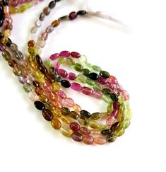 100% Natural Multi Tourmaline Gemstone Oval Beads | Gemstone Tourmaline Smooth Oval Nuggets |Tourmaline Necklace Size - 4x5 - 4x7 MM Approx. TOP QUALITY TOURMALINE Nuggets SIZE - 4x5 - 4x7 MM Approx. Natural Watermelon Tourmaline Length - 14 Inch Contact for bulk Quarries Oval Tourmaline Natural Gemstones, Oval Tourmaline Gemstones, Tourmaline Earrings, Giant Flowers, Oval Beads, Tourmaline Necklace, Tourmaline Beads, Watermelon Tourmaline, Necklace Size