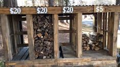 two stacks of firewood stacked on top of each other in front of a wooden structure