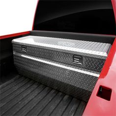 the back end of a pickup truck with its bed open