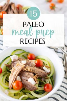 a white bowl filled with meat and veggies on top of a striped table cloth