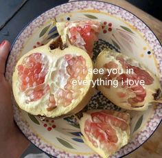 a person holding a plate with some fruit on it that says i see you in everything i love