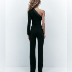 Never Worn. Excellent Condition. Form-Fitting, Sexy Yet Elegant Jumpsuit. New With Tags. Stretch Off-shoulder Jumpsuit For Party, Off-shoulder Stretch Jumpsuits And Rompers For Party, One-shoulder Strapless Jumpsuit For Party, Elegant Fitted One-shoulder Bodysuit, Elegant One-shoulder Evening Bodysuit, Elegant Stretch Pantsuit For Parties, Fitted One-shoulder Jumpsuit For Party, One-shoulder Fitted Jumpsuit For Party, One-shoulder Fitted Party Jumpsuit