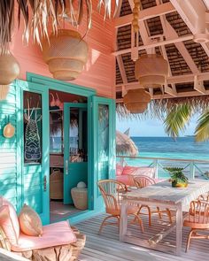 an outdoor dining area with tables and chairs on the deck next to the ocean is decorated in pastel colors