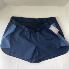 A:Glow Active Maternity Shorts Size M New Navy Blue Stretch Blue Pants With Built-in Shorts, Blue Athleisure Bottoms With Built-in Shorts, Blue Activewear With Elastic Waistband And Short Legs, Blue Summer Activewear With Pockets, Blue Activewear Shorts With Elastic Waistband, Blue Activewear With Pockets And Short Legs, Blue Sports Pants For Summer, Blue Activewear Shorts With Pockets, Blue Activewear With Elastic Waistband In Short Length