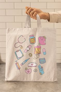 a person holding a shopping bag with various items on it