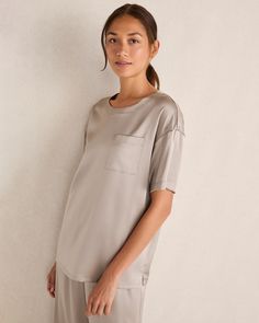 An upgrade to your average sleep tee. This Washable Silk shirt is the chic, sophisticated way to say "goodnight." A classic crew neck and relaxed fit keep you comfortable all night, while the silky-soft luster adds an elevated touch. Details + Design: Short sleeve. Crew neck. Hits at hip. Front pocket. Split hem. 26" length. 19mm. Mulberry Silk. Material: 92% Silk, 8% SpandexCare: Machine Wash; Line DryImported | Washable Silk Sleep Top Haven Well Within Say Goodnight, Classic Style Women, Silk Material, Split Hem, Silk Shirt, Mulberry Silk, The Chic, Modern Classic, Front Pocket