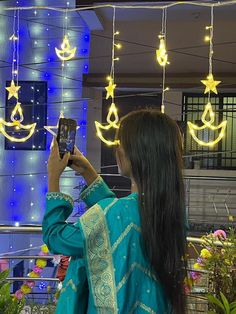 a woman is taking a photo with her cell phone