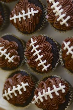 chocolate cupcakes with frosting decorated like footballs