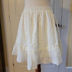 Fun, Flirty, & Flippy, This Skirt Is Just Begging To Be Skipped In! Soft Vanilla White Elastic Waistband-Great Stretch Ruffled Detailing Fully Lined Lightweight Flowy Fit Is Generous, Due To The Great Stretch Afforded By The Waistband. Nwt, No Flaws To Note. Approximate Measurements: Waist: 11.75" Stretches To: 20" Length: 17.5" Don't Hesitate To Make An Offer! Bin#2 Ruffle Shorts, Short Skirt, Cream White, Vanilla, Womens Skirt, Elastic, Skirt, Cream, Outfit Inspo