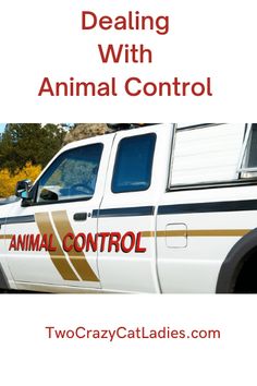 a white truck with the words dealing with animal control