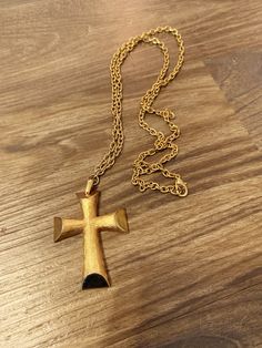 "This is a gorgeous vintage Avon gold cross.  The chain is roughly 32\" long and the pendant is roughly 3\" long.  The cross has an Avon stamp on the back.  The chain has a lobster clasp.   This item is vintage and does show some wear. (see photos). If you would like additional photos of this set please PM me.   It will come wrapped in a kraft jewelry box with a signature Copple Street Vintage Jewelry Card. Perfect for gift giving." Avon Cross Necklace, Round Rock, Jewelry Card, Vintage Avon, Gold Cross, Choker Necklaces, The Cross, Gift Giving, Choker