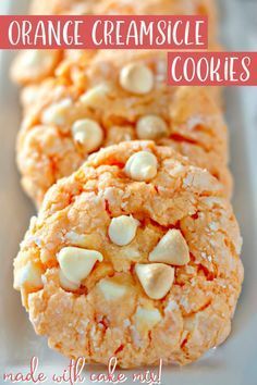 orange creamsice cookies are made with cake mix and have almonds on top