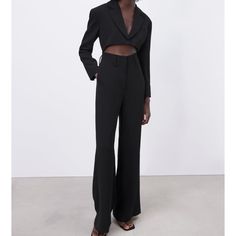 This Beautiful Jumpsuit Has A Center Cut Out, Padded Shoulders, And Zipper In Front. Size Medium Nwt Chic Black Wide Leg Suit, Chic Black Wide-leg Suit, Fitted Cropped Pantsuit For Office, Fitted Cropped Pantsuit For Formal Events, Fitted Cropped Bottoms For Formal Occasions, Fitted Cropped Pants For Formal Occasions, Fitted Cropped Evening Pants, Elegant Cropped Pantsuit For Office, Elegant Cropped Pantsuit For Formal Occasions