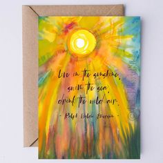 a greeting card with the words live in the sunshine, sun up to see around the world ray of light