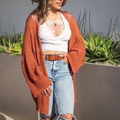 Our Crochet Netted Cardigan- Cream opens up endless style possibilities. Made of an oversized lightweight fabric, this cardigan provides a comfortable fit and a timeless look that will never go out of style. Perfect for layering over any look, day or night. One Size 0-16 Oversize Cardigan, Oversized Cardigan, Womens Tunics, Anaheim, Go Out, Out Of Style, Lightweight Fabric, Tunics, Womens Clothing Tops