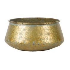 a gold metal bowl on a white background