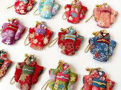 Japanese Kimono Charm made out of Kyoto Chirimen fabric is carefully handcrafted one by one and will make a beautiful gift for any loved ones. Chirimen is a very distinctive and colorful Japanese traditional fabric that is often used to make bags and sashes that are paired with a Kimono. Each one of these charms are unique and special with different fabric designs.  How to use: 1. Take the charm off of the lobster claw attached to the strap 2. Loop the strap through your desired place 3. Clip the Kimono charm back in place - Dimensions: Approximately 2.25"H (5"H with strap) x 2"W - Handmade item, the size and shape may differ slightly Please browse my shop for more beautiful Kimono Charms from Japan! https://www.etsy.com/shop/UnderTheSkyGoods?ref=condensed_trust_header_title_sold&section_i Kawaii Rectangular Craft Supplies For Gifts, Japanese Lucky Charm, Japanese Ornaments, Beautiful Kimono, Kawaii Gifts, Beautiful Kimonos, Fabric Designs, Traditional Fabric, Lucky Charms