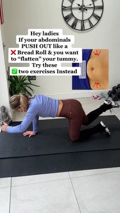 a woman doing push ups on a mat in front of a wall with a clock