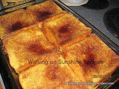 toasted french toast sitting in a pan on the stove