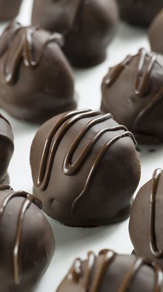 there are many chocolates that have been made to look like they are melted and drizzled